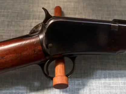 Winchester Model 1890 receiver, hammer, trigger, stock, and octagon barrel detail