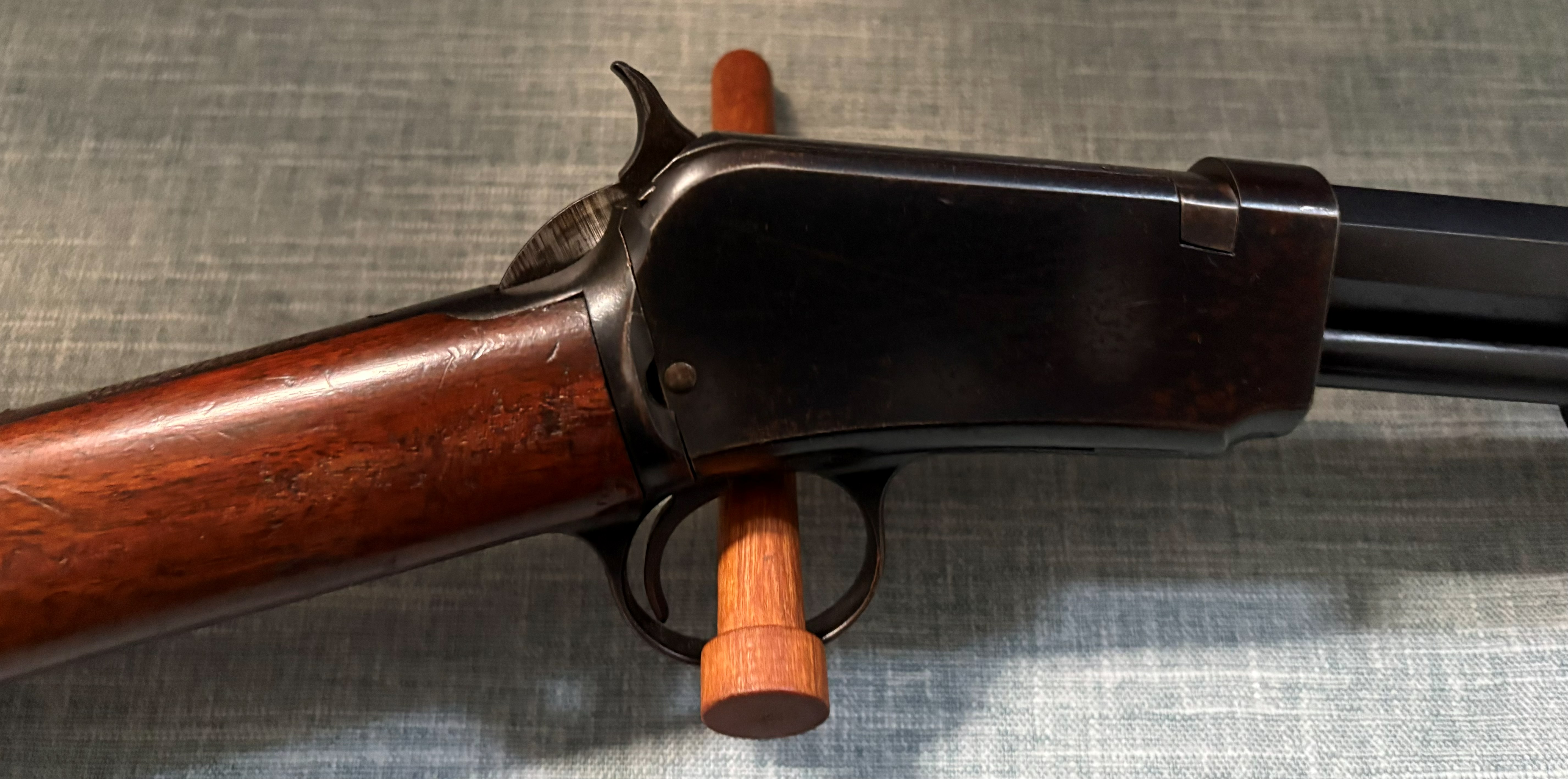 Winchester Model 1890 receiver, hammer, trigger, stock, and octagon barrel detail