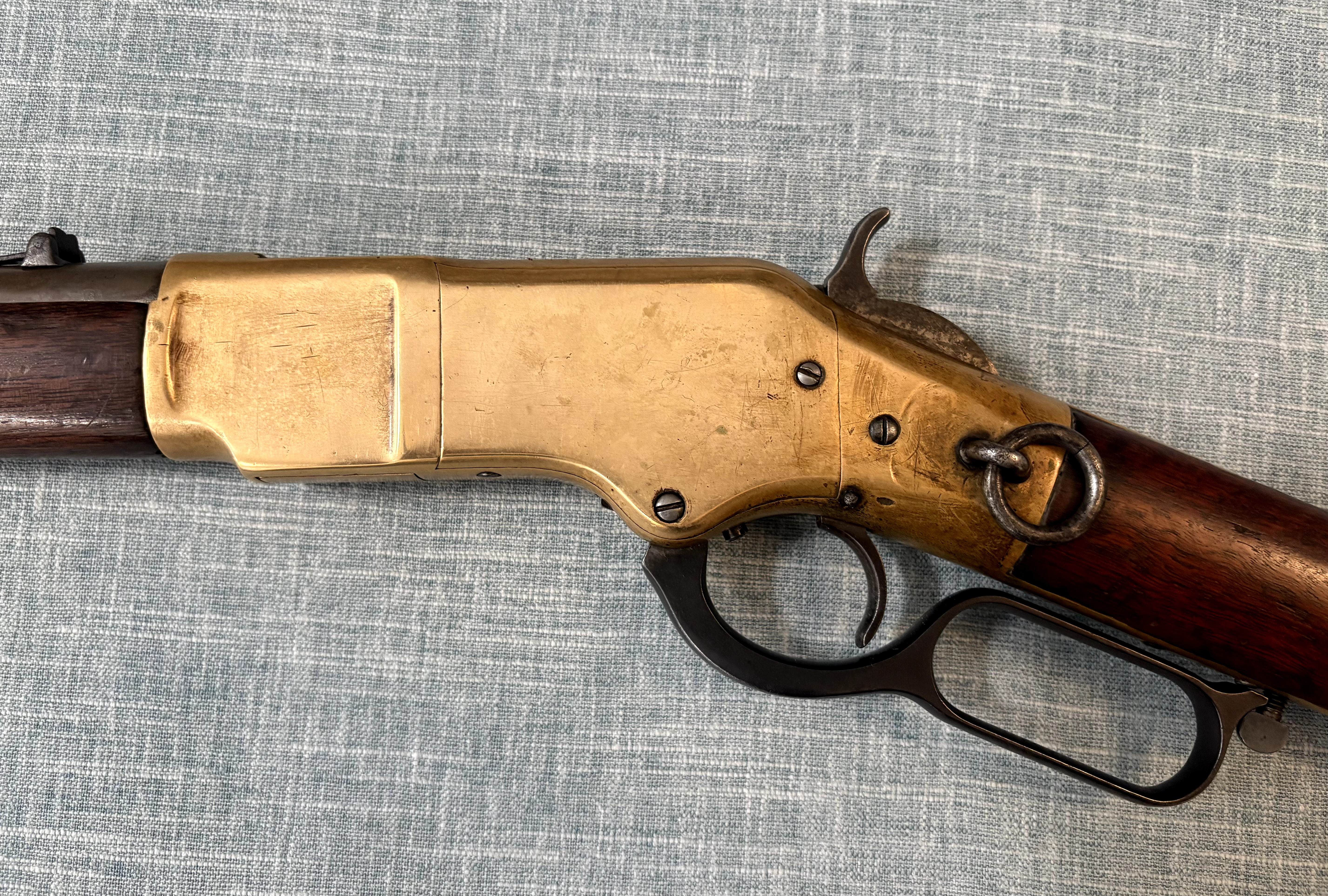 Winchester Model 1866 Fourth Model left-side brass receiver, saddle ring, hammer, and lever
