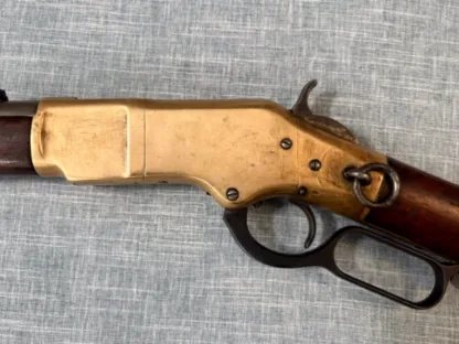 Winchester Model 1866 Fourth Model left-side brass receiver, saddle ring, hammer, and lever