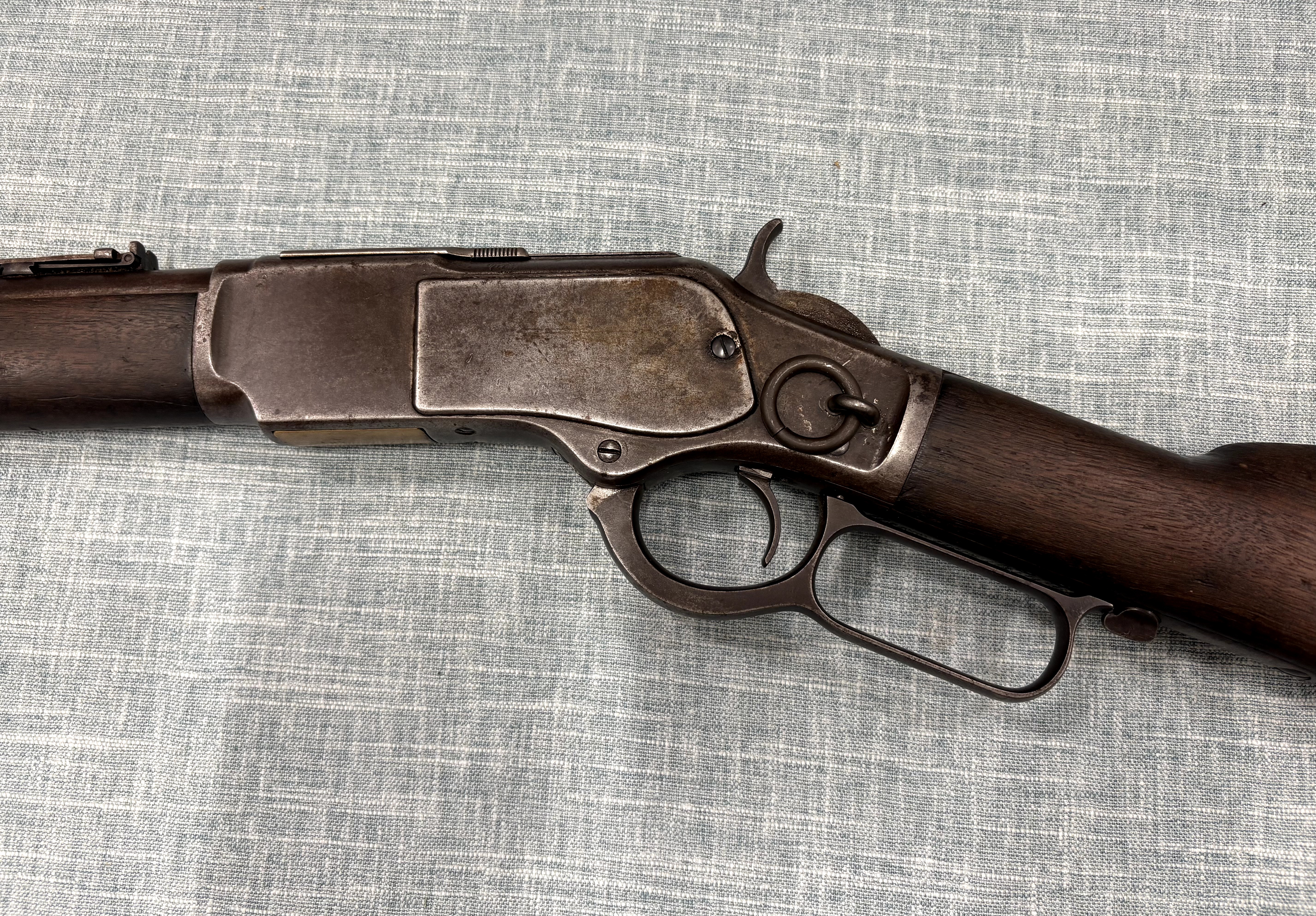 Winchester Model 1873 left-side receiver, saddle ring, hammer, trigger, and lever