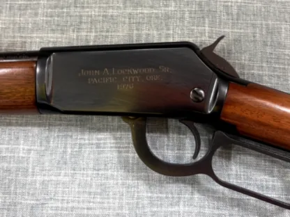 Winchester Model 9422M inscribed left-side receiver, hammer, trigger guard, and lever